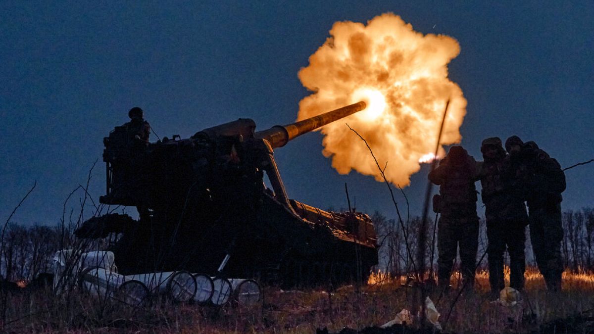 Ukrainian soldiers fire a Pion artillery system at Russian positions near Bakhmut, Donetsk region