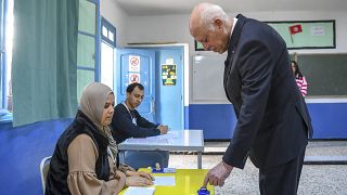 Tunisian president casts vote in controversial elections