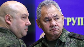 Russia's top military commander in Ukraine, Gen. Sergei Surovikin, left, and Russian Defence Minister Sergei Shoigu attend a meeting with Russian President Vladimir Putin 