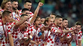 Croatia players celebrate at the end of the World Cup third-place playoff soccer match between Croatia and Morocco, 17 December 2022