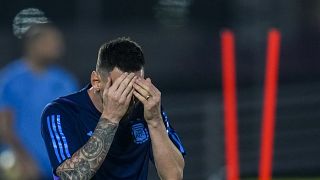 Argentina's Lionel Messi gestures during a training session on the eve of the final soccer match between Argentina and France