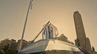Giant Lionel Messi number 10 shirt hangs in the centre of Rosario, the hometown of Argentina's captain