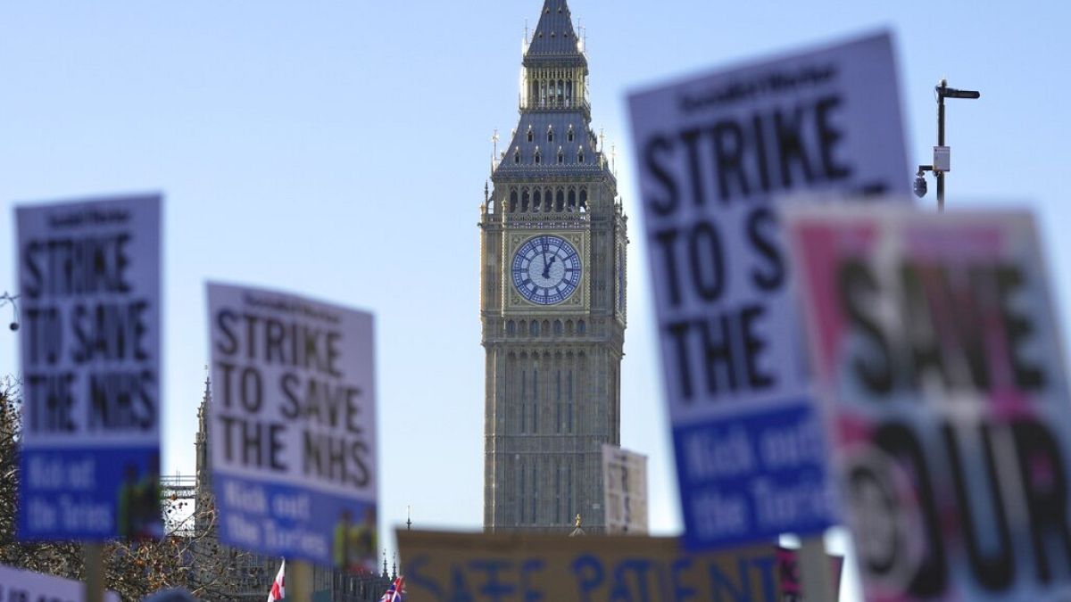 Nurses participate in a protest outside the St. Thomas' Hospital in London, Thursday, Dec. 15, 2022.