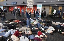 Members of the Global Youth Biodiversity Network demonstrate in the halls of the COP15 convention centre 