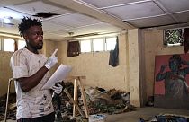 الفنان النيجيري والناشط البيئي أوجين كونبوي (الصورة: فيديو أ ف ب)