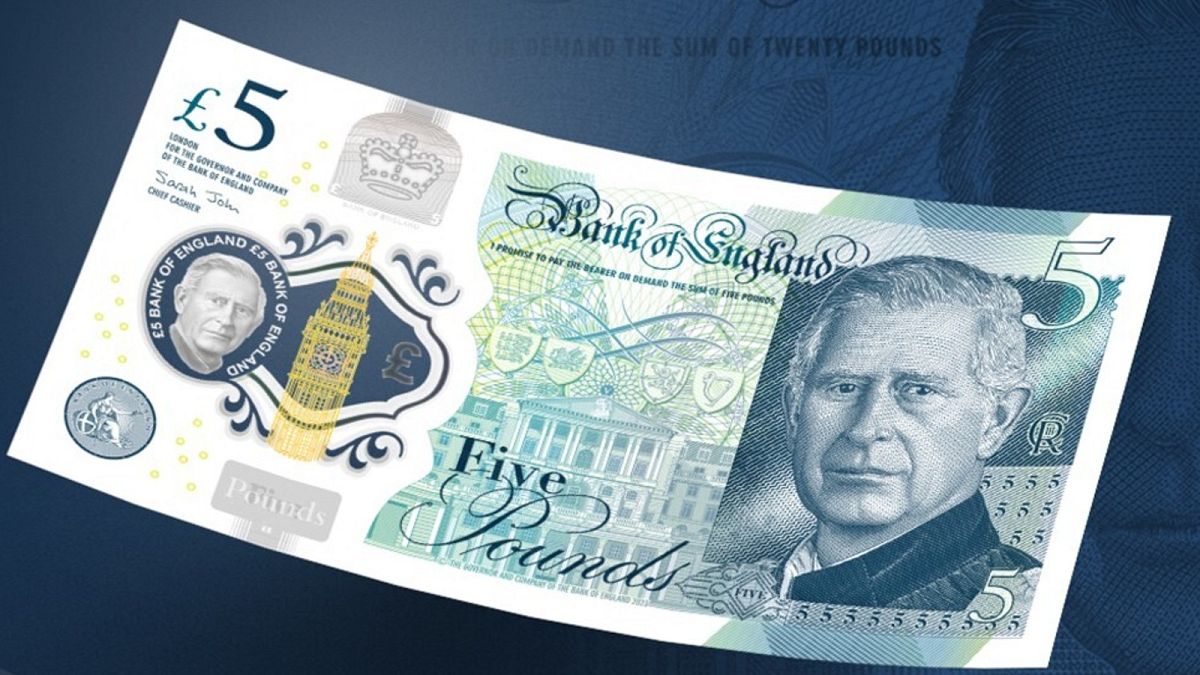 A BoE handout photograph released on December 19, 2022 shows the design of the new £5 polymer banknotes featuring a portrait of Britain's King Charles III.