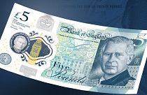 A BoE handout photograph released on December 19, 2022 shows the design of the new £5 polymer banknotes featuring a portrait of Britain's King Charles III.