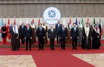 قادة الدول المشاركة في مؤتمر بغداد الثاني للتعاون والشراكة المنعقد في الأردن. 