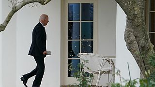 Biden walks to the Oval Office upon arrival on the South Lawn of the White House in Washington, DC on December 16, 2022.