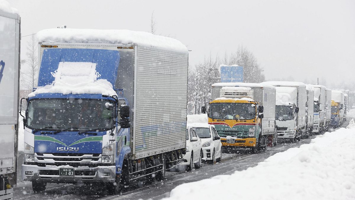 Hundreds of vehicles were stranded on highways in Japan Wednesday night because of snow storm.