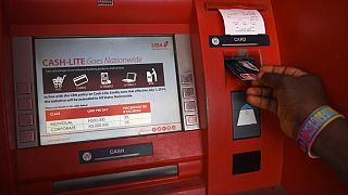 Nigeria eases restrictions on cash withdrawals under popular pressure