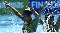 ARCHIVO - Giorgio Minisi y Lucrezia Ruggiero compiten durante la final técnica de dúo mixto de natación artística en los XIX Campeonatos del Mundo de la FINA, 20/06/2022