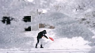 Millions of Americans face frigid temperatures and snowfall