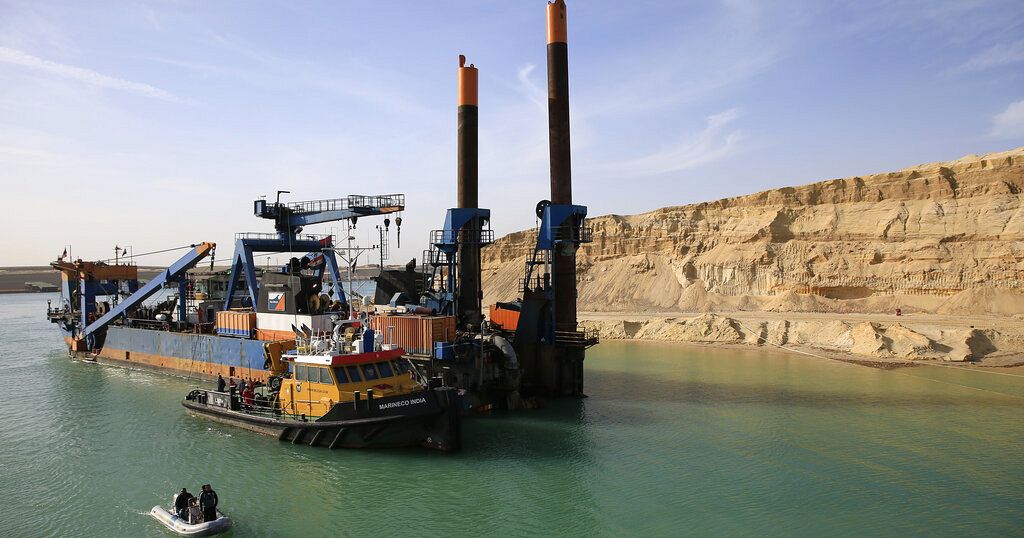 Suez Canal chief seeks to dispel fears over draft Egypt law 