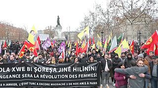 Parisians, Kurdish activists and anti-racism groups stage a protest against Friday's shooting in Paris.