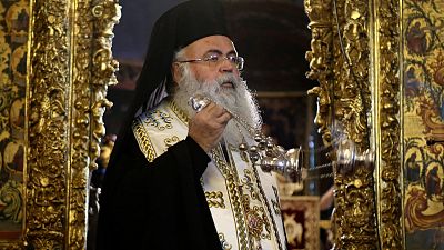 FILE: Cyprus' Orthodox Archbishop Georgios attends a mass at Saint Ioannis church at archbishopric in capital Nicosia, Cyprus, Saturday, Dec. 24, 2022.