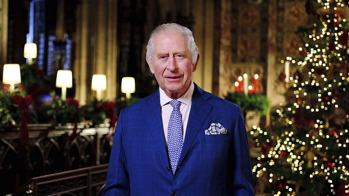Britain's King Charles III delivers his first message in the Quire of St George's Chapel at Windsor Castle.