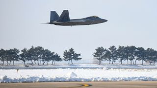 A South Korean jet in the skyline after Seoul said North Korea launched drones into its airspace. 