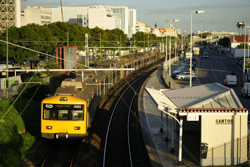 A suburban train leaves Santos train station in Lisbon.