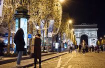 The lights on the Champs Elysees are turned off at an earlier time this year to save energy.