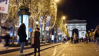 The lights on the Champs Elysees are turned off at an earlier time this year to save energy.