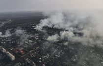 Smoke billows after Russian attacks in the outskirts of Bakhmut, Ukraine, Tuesday, Dec. 27, 2022.