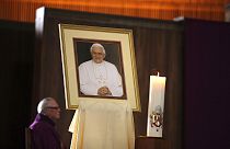 A portrait of pope Benedict XVI on the altar of St. Mary's Cathedral in San Francisco, Calif., during a mass of thanksgiving on his retirement Thursday, February 28, 2013. 