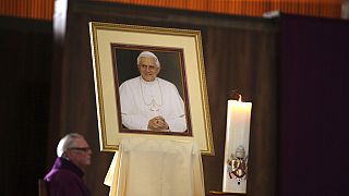 A portrait of pope Benedict XVI on the altar of St. Mary's Cathedral in San Francisco, Calif., during a mass of thanksgiving on his retirement Thursday, February 28, 2013. 