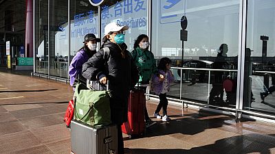 An inbound traveler prepare to cross immigrations at the Guangzhou Baiyun Airport in southern China's Guangdong province on Dec. 25 2022.