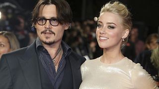 Johnny Depp és Amber Heard a Rumnapló című közös filmjük 2011-es bemutatóján. 