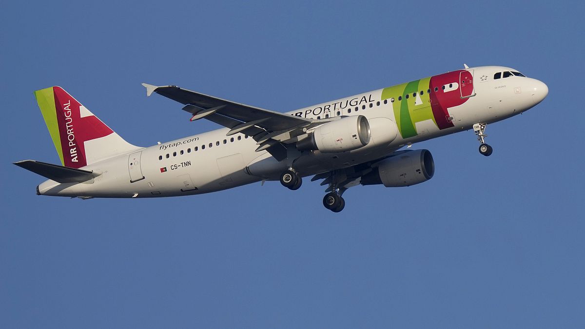 A TAP Air Portugal Airbus A320 approaches for landing in Lisbon.