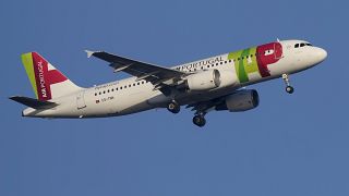 A TAP Air Portugal Airbus A320 approaches for landing in Lisbon.