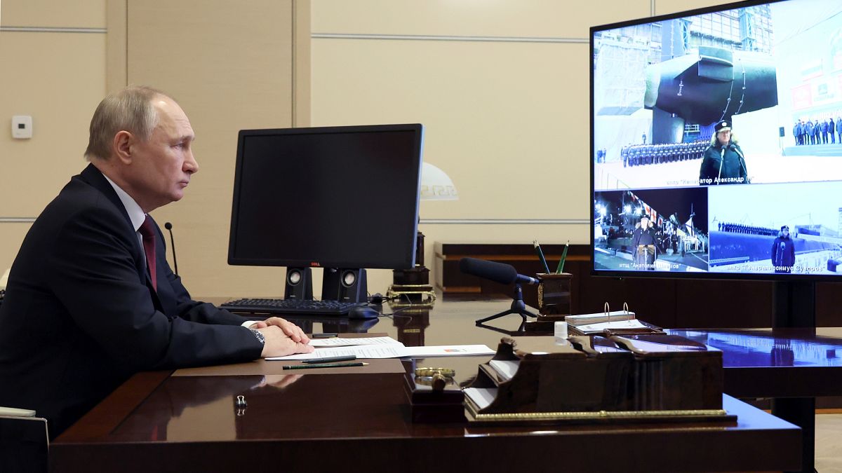 Russian President Vladimir Putin oversees the commissioning of new ships for the Russian navy via video conference.