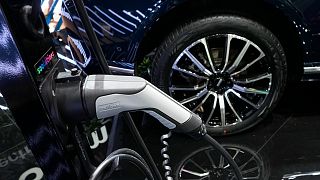 An electric plug in station for electric vehicles is pictured at the Paris Car Show, Oct. 17, 2022 in Paris. 