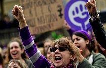 Women shout slogans during International Women's Day in Pamplona, northern Spain, Sunday, March 8, 2020.
