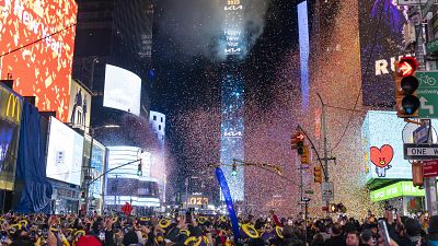 Times Square lights up for the 2023 ball drop in New York. 
