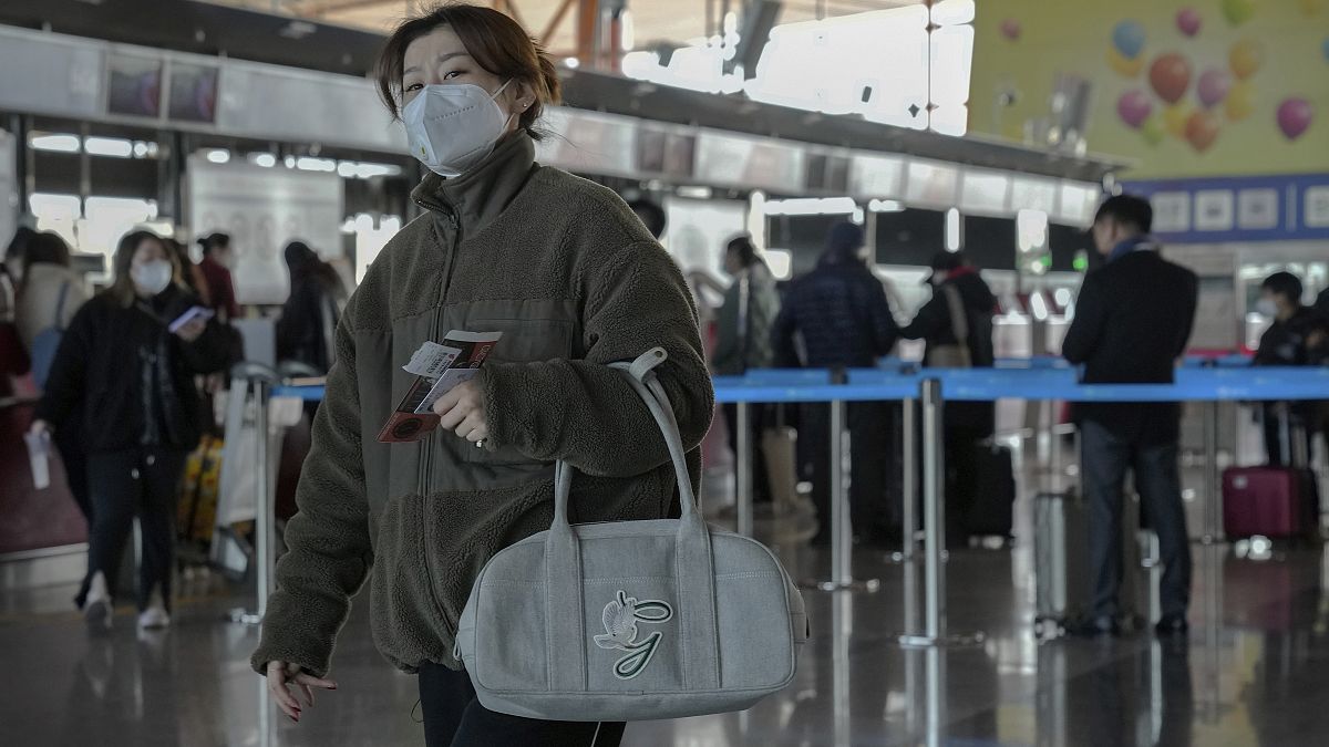 Пассажирка в аэропорту Пекина