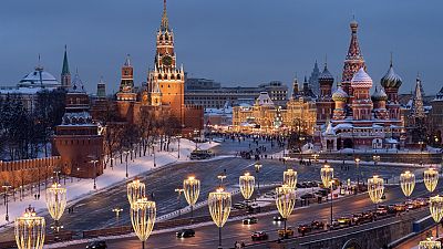 The Kremlin Wall, the Spasskaya Tower, Red Square, the GUM department store, the St. Basil's Cathedral and the Bolshoy Moskvoretsky Bridge are decorated for the New Year