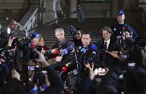 Lawyers for former European Parliament Vice-President Eva Kaili, Michalis Dimitrakopoulos, center right, and Andre Risopoulos, center left, speak with the media, 22 Dec 2022.