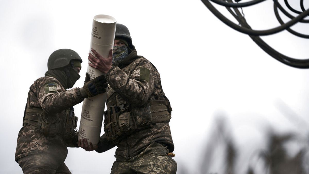 Ukrainian soldiers prepare to fire a French-made CAESAR self-propelled howitzer towards Russian positions near Avdiivka, Donetsk region, Ukraine, Monday, Dec. 26, 2022.