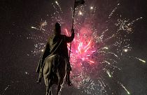 Fireworks light the sky above the Statue of St. Wenceslas at Prague´s Wenceslas Square during the New Year celebrations in Prague, Czech Republic, Jan. 1, 2016.