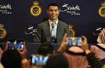 Cristiano Ronaldo smiles during a press conference for his official unveiling as a new member of Al Nassr soccer club in in Riyadh, Saudi Arabia, Tuesday, Jan. 3, 2023. 