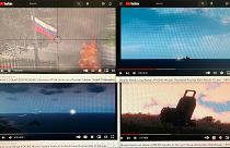 A computer screen with four YouTube windows displaying combat clips from Arma 3.