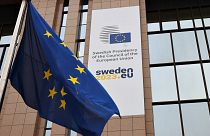 Флаг Швеции у здания Совета ЕС
