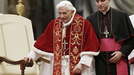 Pope Benedict XVI flanked by personal secretary Archbishop Georg Gaenswein during a Mass in 2013