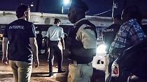 صورة من الارشيف لضباط الإنتربول أثناء مداهمة شبكات للاتجار بالبشر في جورجتاون،غيانا 