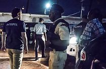 Interpol officers during a raid in night clubs in Georgetown, Guyana, on April 7, 2018.