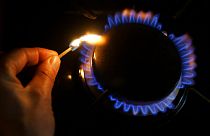 A gas ring is lit on a cooker in this photo illustration in London, Thursday, Feb. 21, 2008. 