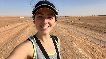 Euronews Travel reporter Hannah Brown in the Sahara desert in Algeria