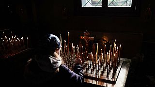 Power goes out as the service at Saint Nicholas Monastery in Mukachevo draws to a close